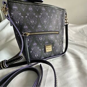 Dooney & Bourke Black and Purple Haunted Mansion Disney crossbody bag